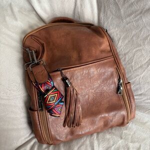 Backpack Faux leather caramel brown  colorful tribal print strap tassel detail